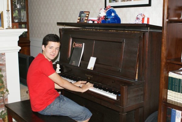 Pedro at the Nelson family piano, July 2010