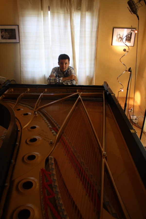 Pedro rests at the 9-foot Steinway, The Piano Studio, Seattle, July 2011.